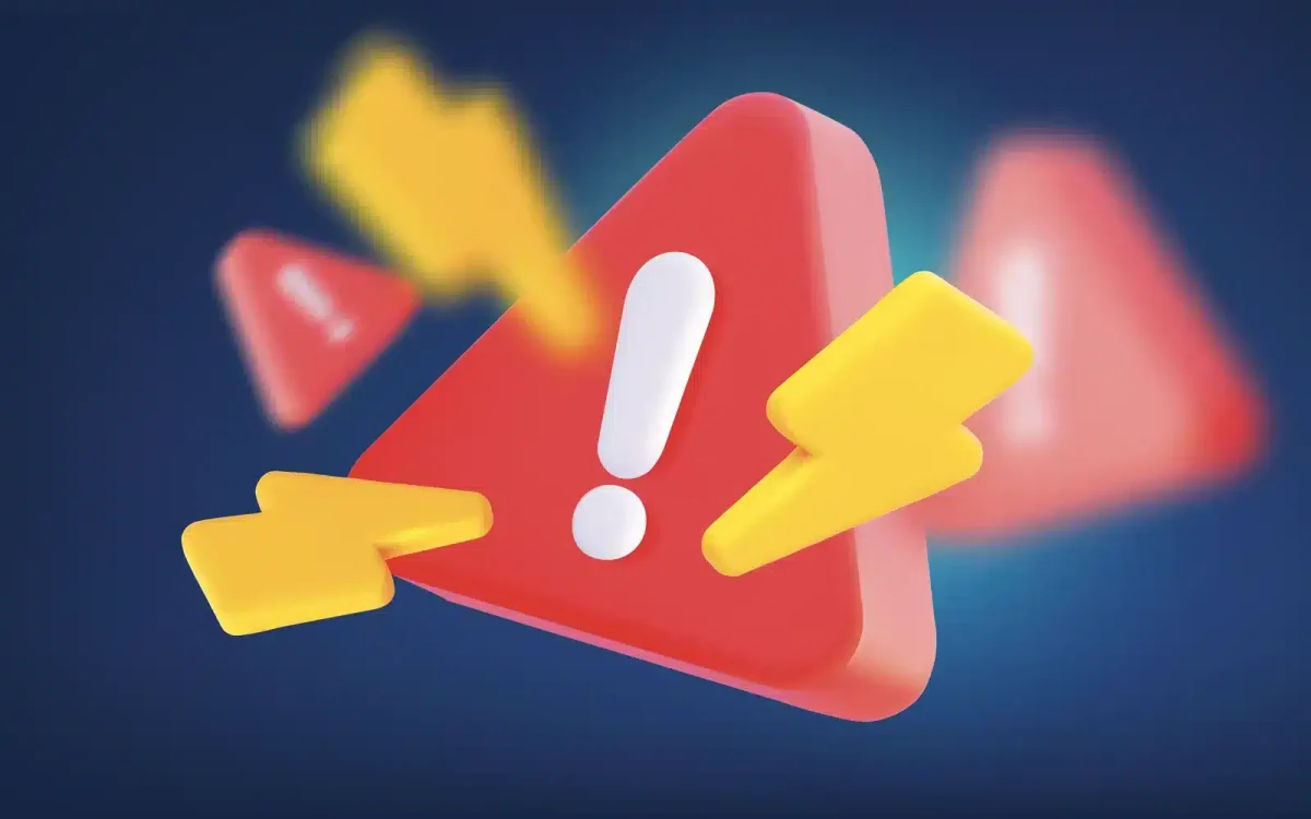 Un panneau d'avertissement triangulaire rouge avec un point d'exclamation au centre, entouré d'éclairs jaunes sur fond bleu, signifie des erreurs de connexion WordPress.